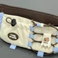 Cute aesthetic pencil case multi-functional storage pouch with elastic cord and cookie charm style. - Blue