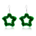 Detailed view of green fuzzy star-shaped earrings with silver hooks for Christmas - Green Star