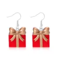 Feestelijke kerstoorbellen van hars met rood geschenkdoosje en gouden strikje - Rode Kerstcadeaudoos