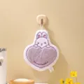 Hanging coral fleece hand towel featuring a cute cartoon rabbit holding a purple heart - Heart Rabbit