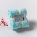 Soft coral fleece face towel in light blue, folded neatly with a ribbon and tag for daily use. - 36*80cm / Light Blue