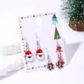 Festive Christmas earring set featuring enamel Santa Claus and gift box designs on display card. - Gift Box Earrings Style (15#)