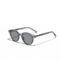 Stylische runde TR90 Sonnenbrille mit transparentem blauem Rahmen und grauen Gläsern. - Transparentes Blau