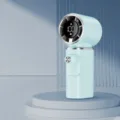 Light blue handheld turbo fan with digital display and 100-speed portable design. - Light Blue