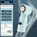 Light blue portable mini fan with digital display and cooling function, 100 speeds. - F29 Light Blue [Ice Compress Model + Foldable Neck Fan]