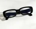Detail view showing retro black small square frame glasses and temple size specifications. - Glossy Black Clear Lens