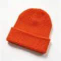 Leuchtend orangefarbene dicke Strickmütze mit Ananasmuster für stilvolle Winterwärme - L / Orange