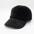 Detailed texture view of a black teddy fleece baseball cap with a corduroy brim. - Adult (55-60cm) / Two-Tone Black