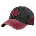 Close-up of washed distressed baseball cap with embroidered red maple leaf patch - Maple Leaf Applique (55-60cm) / Dark Gray + Wine Red Brim