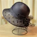 Elegant black sun hat for women with polka dot mesh brim and large flower accent - 56-58cm / Black