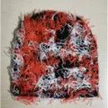 Distressed frayed knit beanie hat featuring red white and black yarn for winter warmth - One Size / Black Orange and White