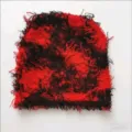 Warm red and black fuzzy knit beanie with shaggy camouflage texture for winter. - One Size / Red and Black