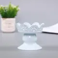 Detail view of a light blue iron dessert stand with delicate lace hollow out design. - Epiphyllum Pattern Cup