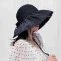 Elegant women's black wide-brim sun hat featuring UV protection and straw crown. - M (56-58cm) / Bucket Hat (B-5) / Black