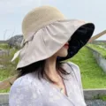 Women's wide-brim sun hat with black UV protection coating and decorative bow detail - M (56-58cm) / Bucket Hat (B-5) / Beige