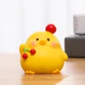 Adorable yellow resin chick figurine holding red cherries for desktop or cake decor - Chick Party Cherry / Yellow (Cherry Chick)