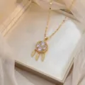 Elegante collana acchiappasogni d'oro con ciondolo a forma di cuore di quadrifoglio in zircone. - X1006 / Quadrifoglio Piuma