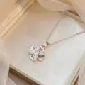 Detailansicht der drehbaren Sonnenblumen-Halskette mit glänzenden Zirkonia-Steinen - Rotierender Vierblättriger Blumenstil (X0503) / Silber