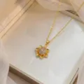 Rotierbare goldene Sonnenblumen-Halskette mit rosa Zirkonia-Kristallen für Damen - Pink Violett Zirkon Sonnenblumen-Stil (X0561-1) / Gold