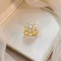 Elegant gold plated flower ring with white pearl and marquise cubic zirconia stones - Double Layer Zirconia Pearl Ring (J1196)