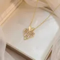 Elegant gold plated heart pendant necklace with baguette zircon stones, SKU view. - Hollow Zirconia Heart Style (X0741)
