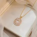 Elegant gold-plated titanium steel necklace with a zircon floral pendant in a gift box. - Rectangular Flower Style(X0750)