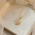 Elegante vergoldete rotierende Sonnenblumenkette mit weißen Zirkonia in einer Premium-Box - Drehbarer Marquise-Zirkon Sonnenblumen-Stil (X0567)