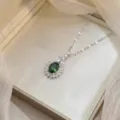 Elegant emerald green zircon flower petal pendant necklace with silver link chain - Oval Emerald Flower Cluster (X0433)