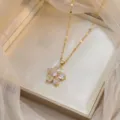 Elegant gold flower pendant necklace with sparkling cubic zirconia in jewelry box - White-4 (X1590)