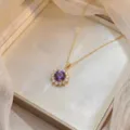 Élégant collier en or avec pendentif en zircone cubique en forme de fleur violette - Style Tournesol Violet (X0946)
