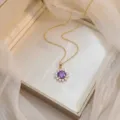 Élégant collier doré avec pendentif étoile en zircone violette dans un écrin de luxe. - Style Tournesol Violet (X0946)