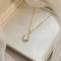 Elegant gold necklace with sparkling clear round cubic zirconia flower pendant - Clear Round Gold Chain (X0437-2)