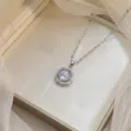 Elegant silver-tone necklace featuring a planet-style halo pendant with clear zirconia - Planet Design Round Clear Zirconia (X0450)