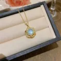 Elegant gold-plated necklace with light green floral pendant and sparkling zircon accents - X0268 Gold Five-Petal Blue Main Stone Necklace / Gold