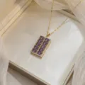 Elegant gold-tone necklace featuring a rectangular pendant with purple oval zircon stones. - Purple Rectangular Pendant (X0451-4)