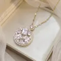 Elegant gold clavicle chain featuring a large clear cubic zirconia flower pendant design. - Hollow Flower Clear High Bright Zirconia (X0496)