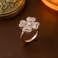 Eleganter rotierender Ring in Roségold mit funkelndem Zirkonia-Blumendesign - Ring (J0057) / Stil 3 / Roségold