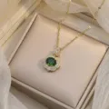 Elegant gold flower necklace with green emerald zircon and sparkling white crystals. - Flower Emerald Double Layer Halo (X0499-1)