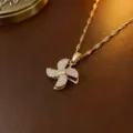 Elegante goldene rotierende Windmühlen-Halskette mit Zirkonia in modischem Design - Halskette (X0038) / Gold