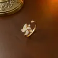 Luxuriöser vergoldeter rotierender Blumenring mit funkelnden weißen Zirkoniasteinen für Damen - Ring (J0016) / Gold