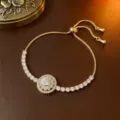 Goldenes rotierendes Zirkonia-Blumenarmband - Armband (TS0122--1) / Gold