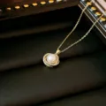 Elegant titanium steel pearl necklace with sparkly orbit pendant in luxury gold finish. - Star Ring Pearl Style (X0107)