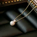 Elegant pearl pendant necklace in gold finish stainless steel for women. - Single Pearl Rhinestone Style (X0117)