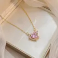 Elegant gold-tone necklace featuring a sparkling pink heart zircon pendant for women - Luxury Pink Heart Style (X0759)