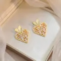 Elegant gold heart-shaped earrings with sparkling cubic zirconia stones for women - Heart Earrings (E0467)