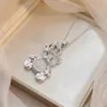 Collier pendentif ours argenté scintillant avec couronne et accents de pierres roses - Style Ours à Couronne Argenté (X0660--2)