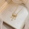Golden Ruyi-lock pendant necklace with cat's eye stone and zircon in jewelry box. - Safe Lock Cat's Eye Stone Style(X0778)