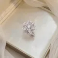 Elegant silver snowflake ring featuring clear zircons on premium white satin base - Snowflake Ring (J0365)
