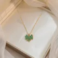 Gold-plated necklace featuring a pixelated green heart pendant with small star detail - Green Pixel Heart Style (X0783)