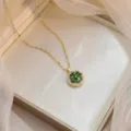 Elegant gold titanium steel necklace with green zircon flower pendant in gift box - Flower Rotating Necklace (X0724) / Gold Green